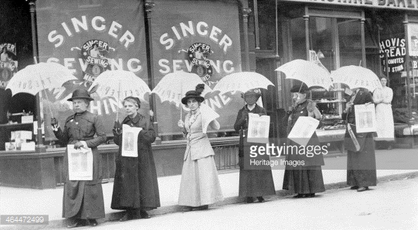 Selling copies of The Suffragette outside the WSPU Brighton headquarters (Photo: Getty Images).